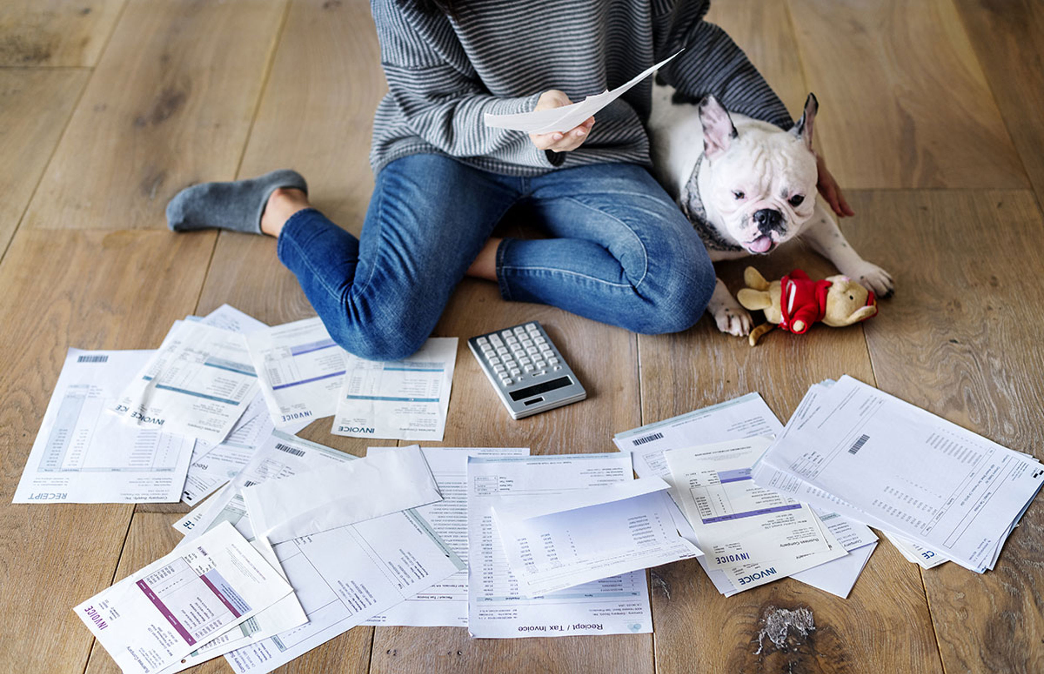 Lady On Floor With Dog And Paperwork