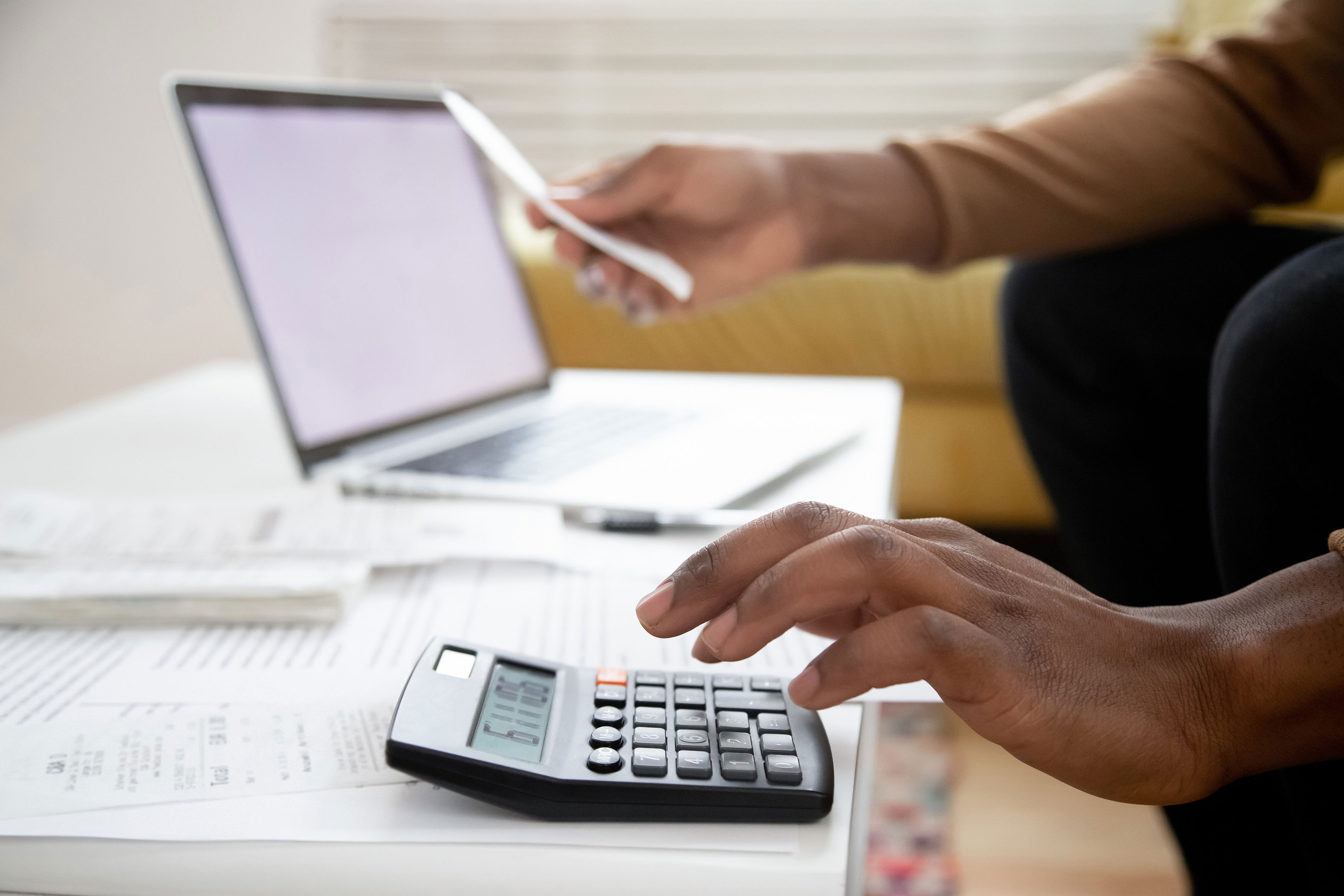 Man Calculates Expenses