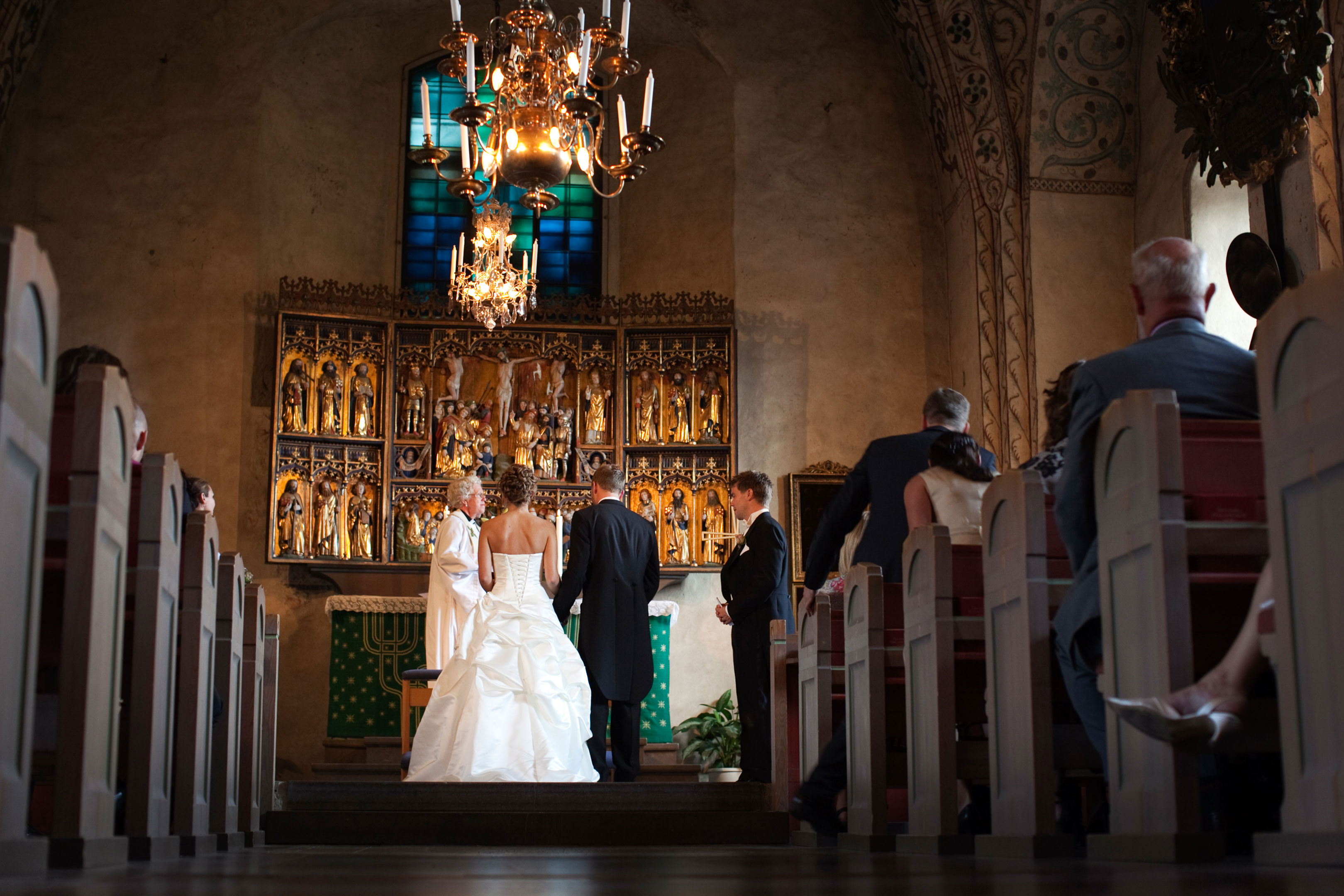 Bride And Groom Standing At The Alter