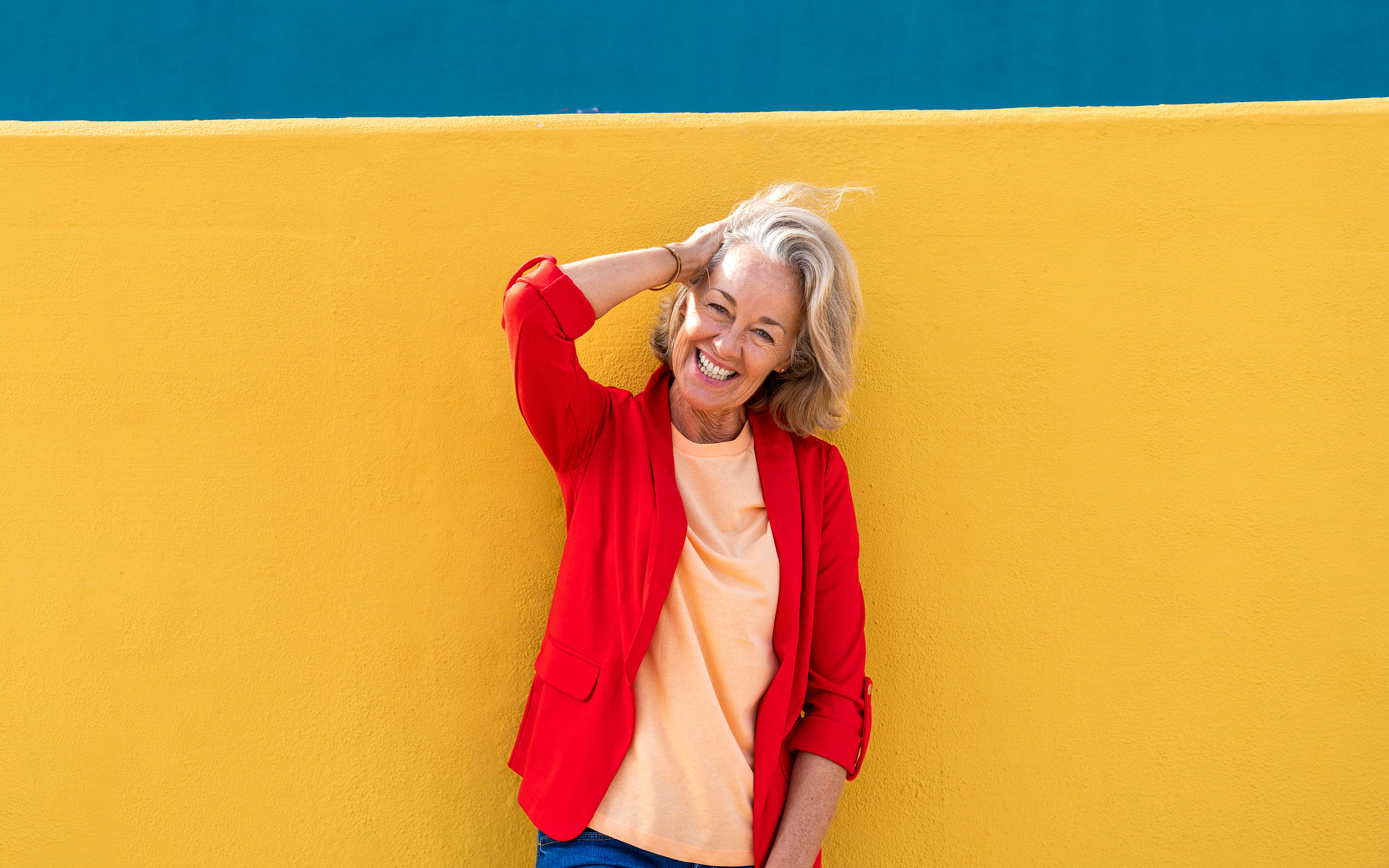 Image shows five glass jars, each containing coins and labeled with different categories: Travel, House, Charity, Car, and Health. The jars are arranged in a row on a white surface against a plain background.