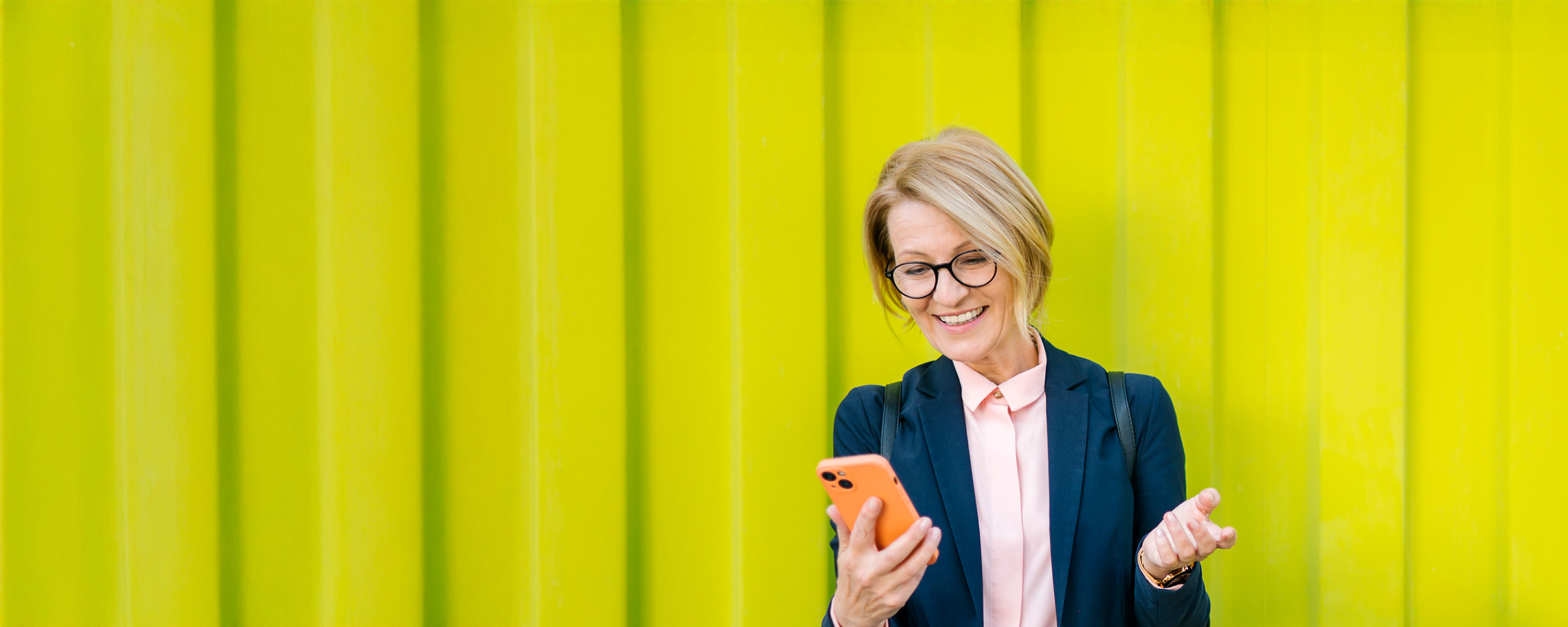 A pixelated, abstract image featuring horizontal bands of red, pink, and purple, with some pixel grid patterns visible throughout. The colors transition from red at the top to purple at the bottom.