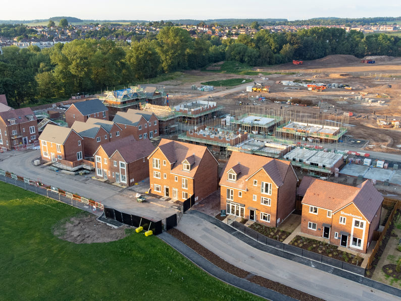 Aerial view looking down on new build housing construction site in England, UK