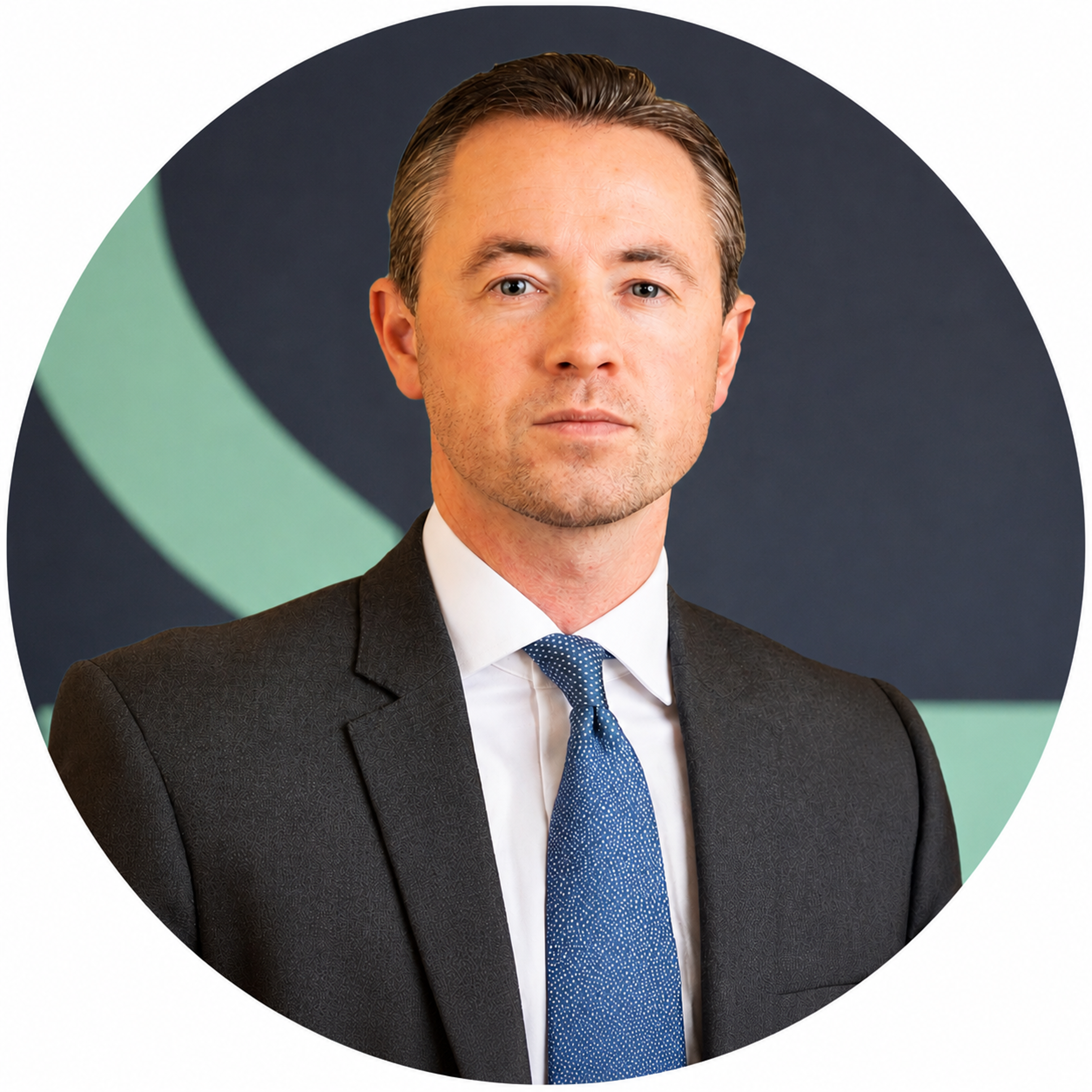 A man in a dark suit, white shirt, and blue tie poses for a professional headshot against a dark background with a light green curved design.