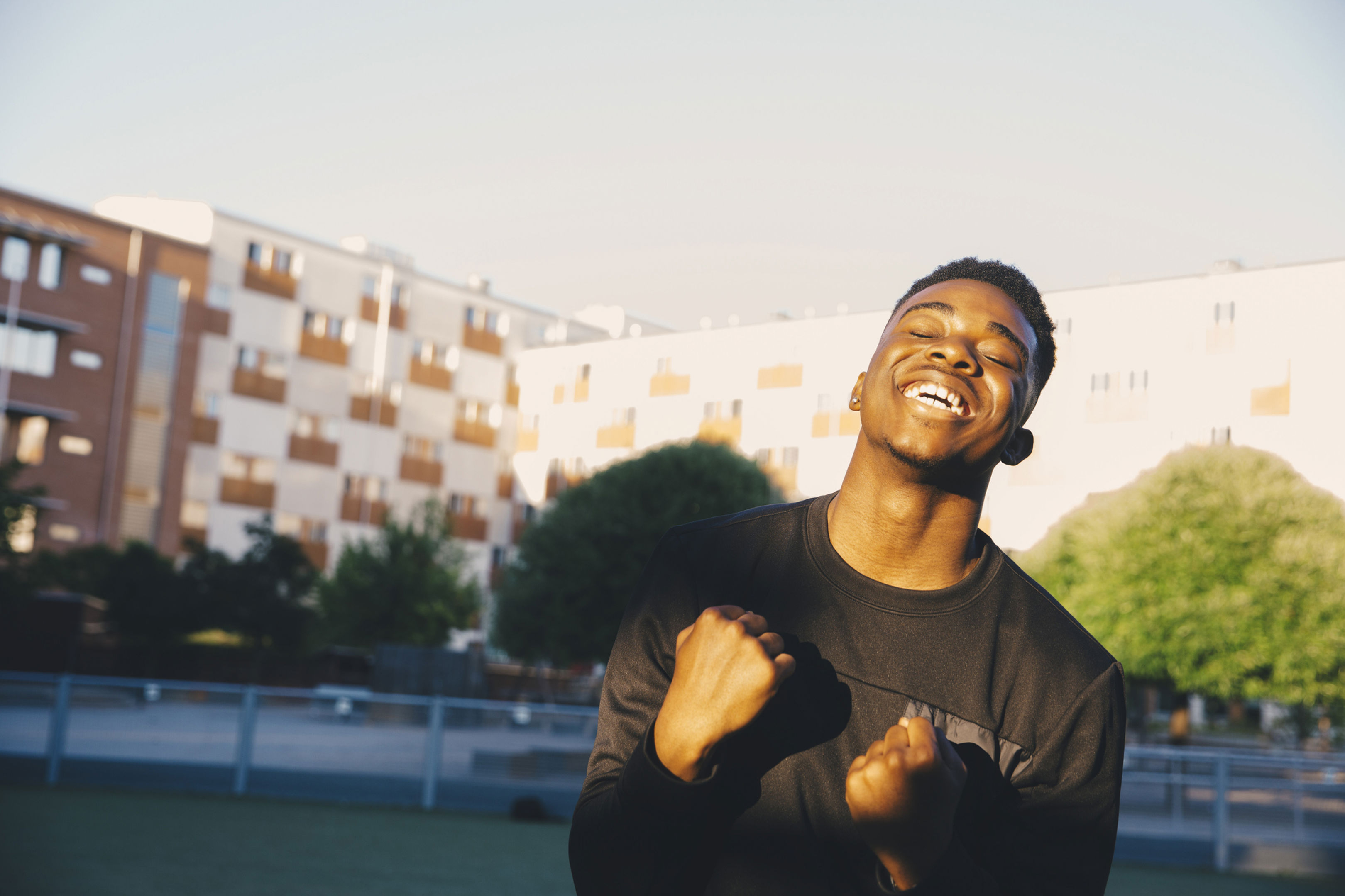 Man Clenching Fists Happy