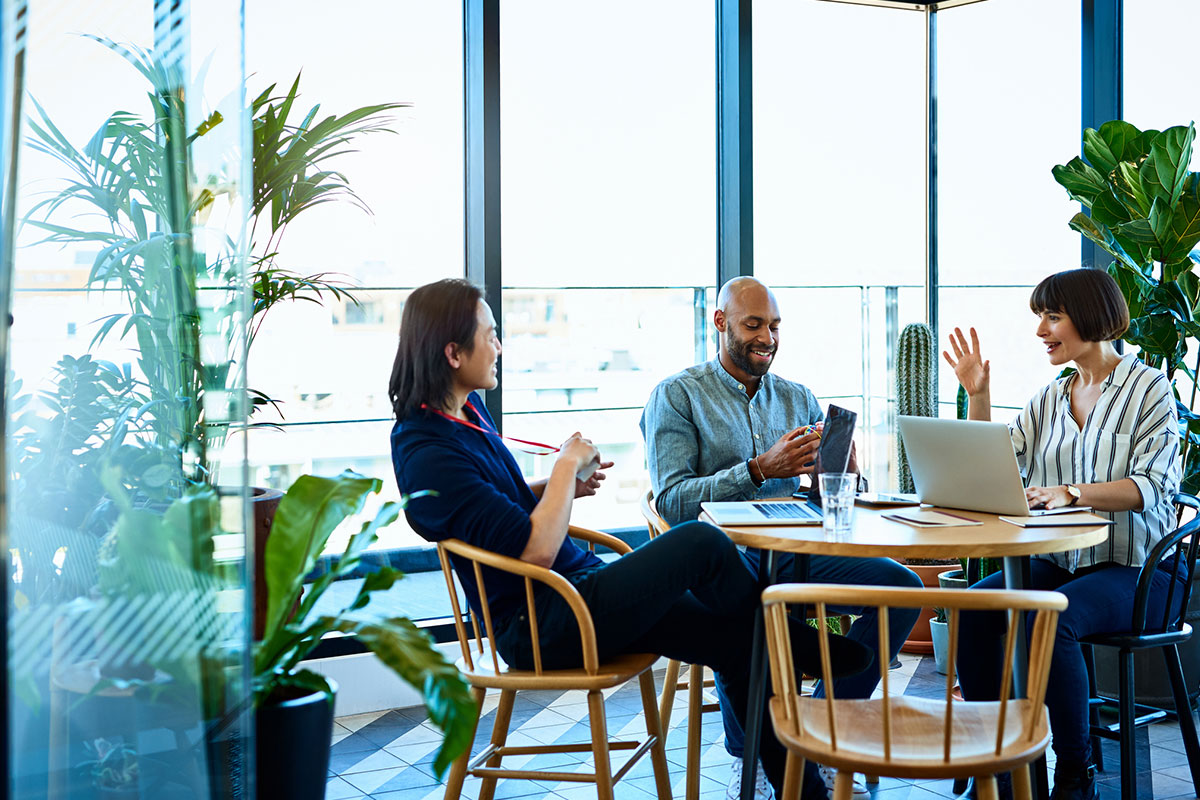 People Talking At Table