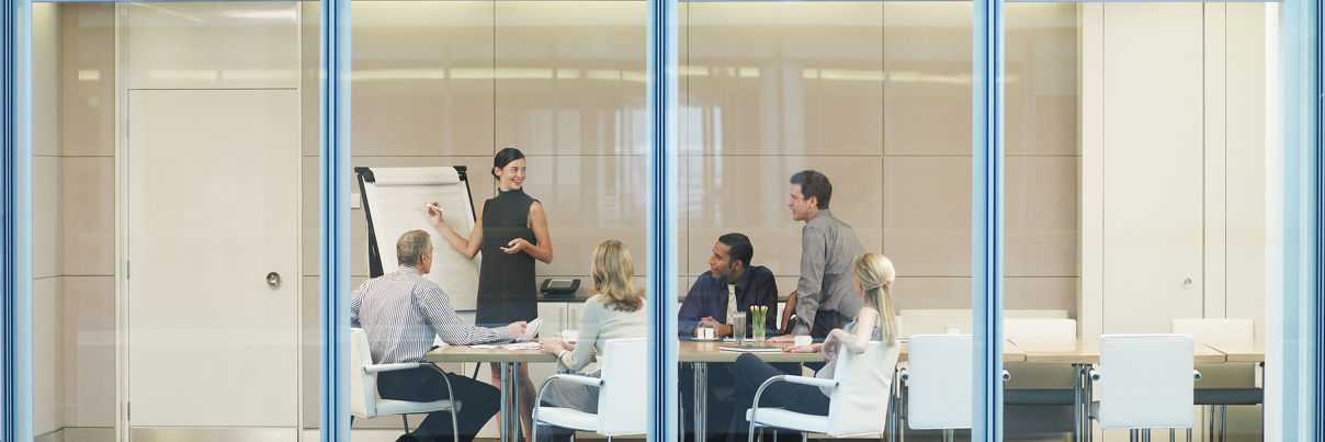 Businesspeople Having Meeting In Conference Room