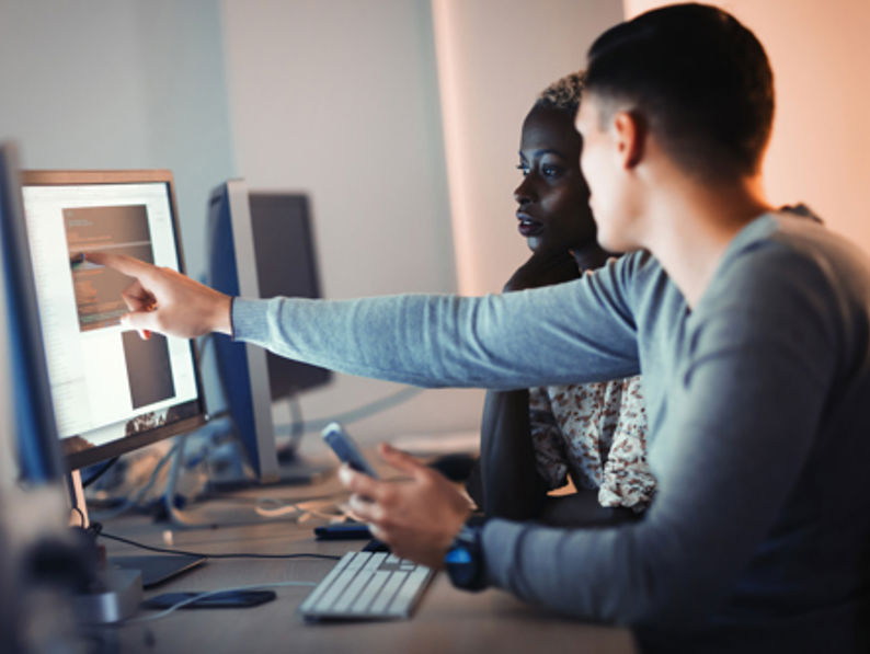 Programmers Cooperating At It Company Developing Apps